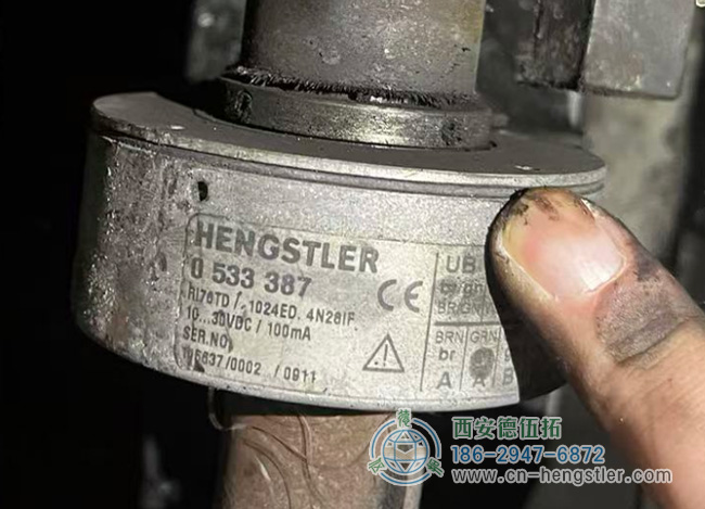 图为HENGSTLER RI76TD空心轴编码器实际使用照片